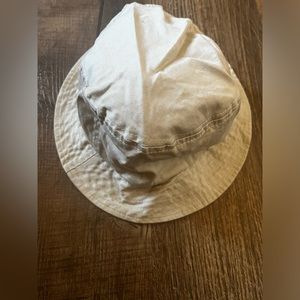 Cream bucket Hat. One size fits most. Excellent condition!